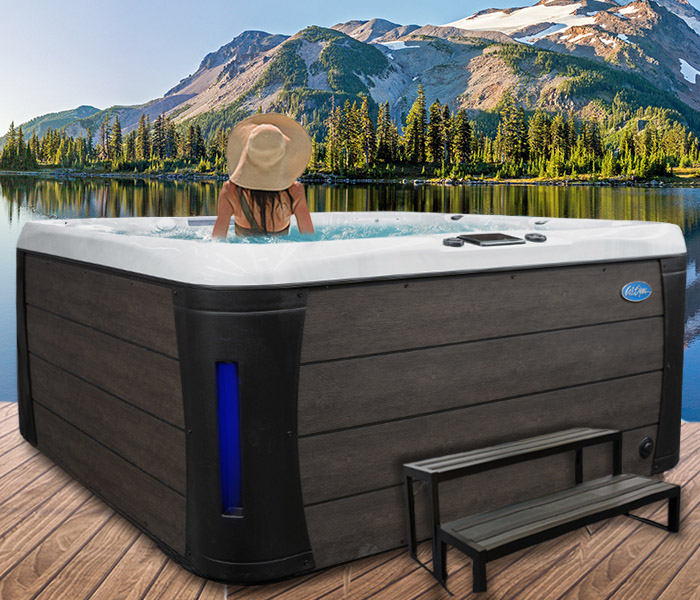 Calspas hot tub being used in a family setting - hot tubs spas for sale George Morlan